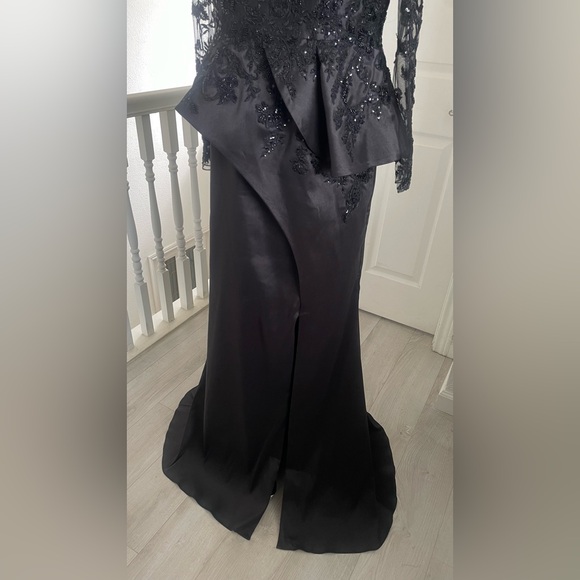 Terani Couture Embroidered Long Sleeve Front Slit Ruffled Mermaid Gown.